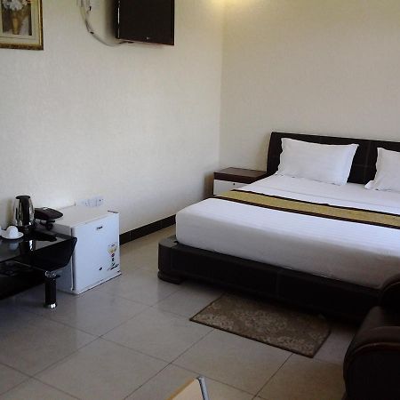 Best Point Hotel Daressalam Zimmer foto