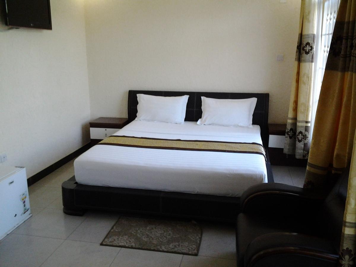 Best Point Hotel Daressalam Zimmer foto