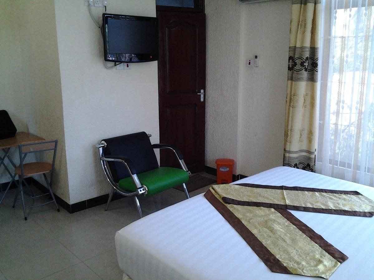 Best Point Hotel Daressalam Zimmer foto