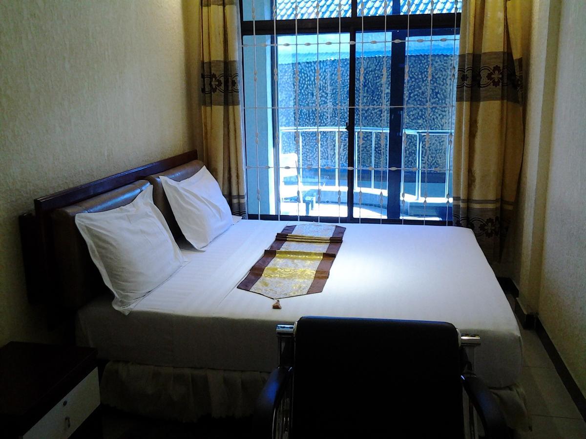 Best Point Hotel Daressalam Zimmer foto